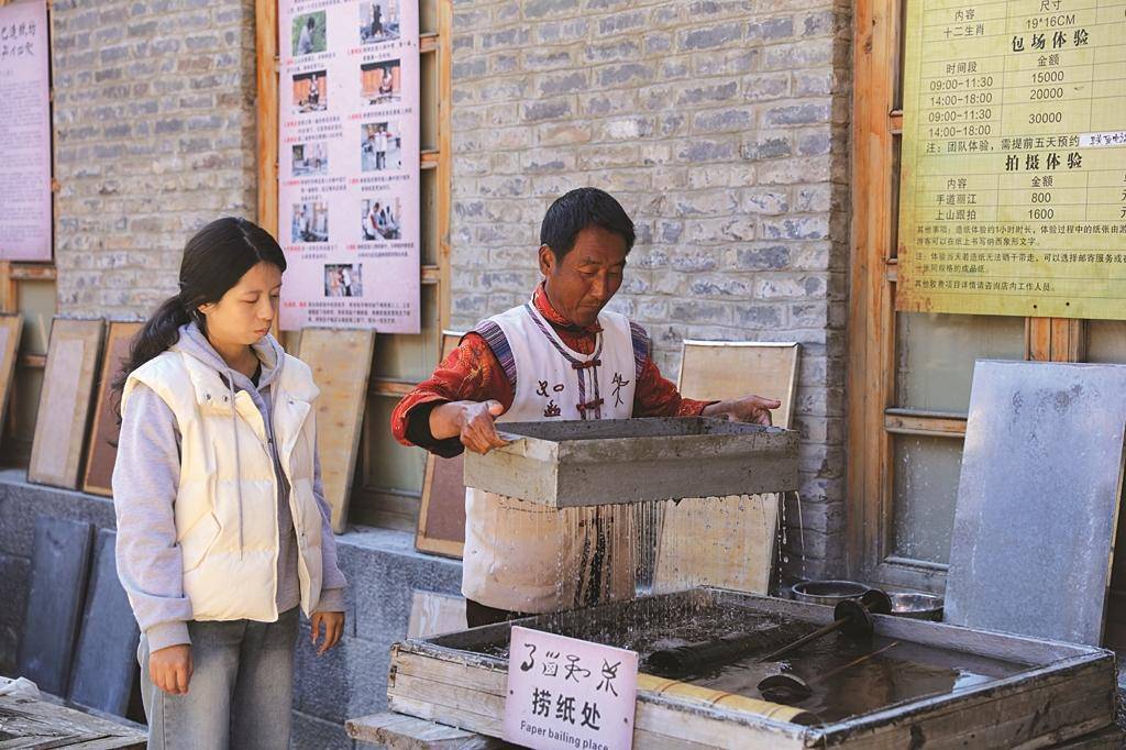 麗江古城:在文化傳承中對話古今_納西_遊客_東巴