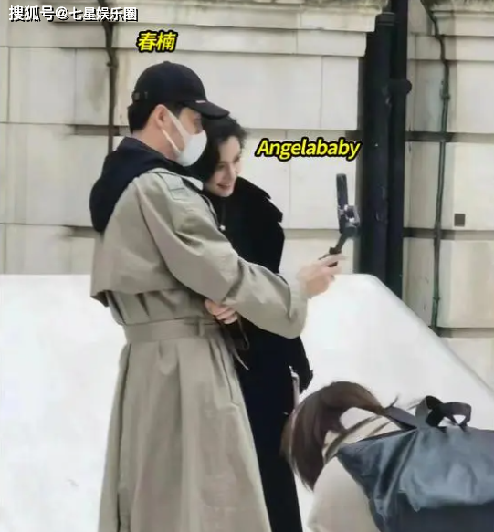 angelababy浑身奢侈品现身伦敦,与混血男孩合影,身材