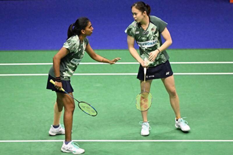 女双世界排名第14的陈康乐/提娜世界排名第14的陈康乐/提娜,被东抵鼢