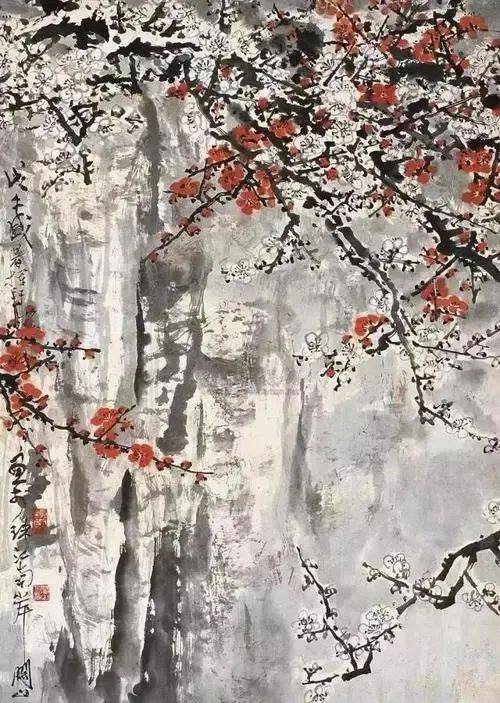 这雪中红梅如火如荼地绽放