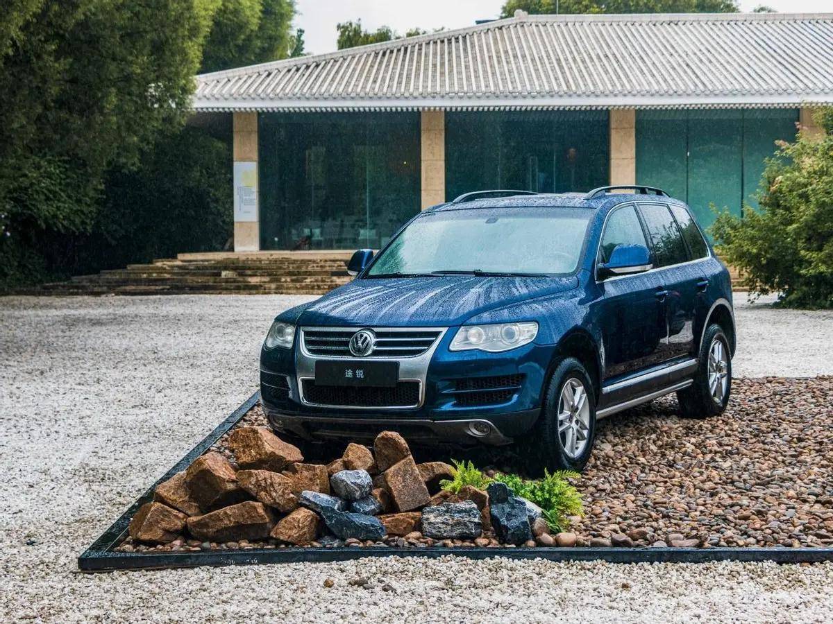 低调豪华suv演变史,大众途锐的20年_搜狐汽车_搜狐网