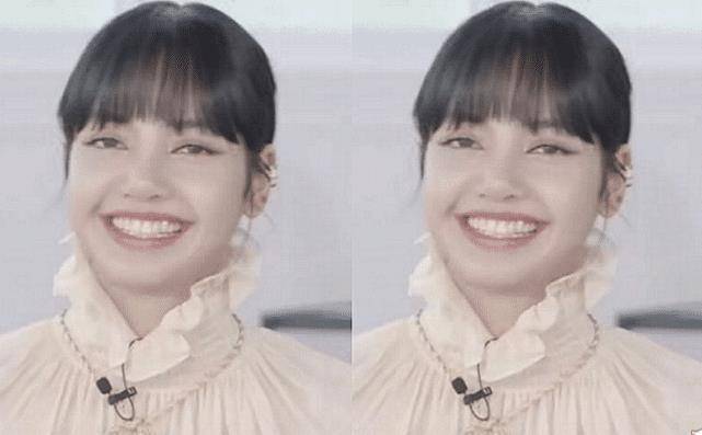 在这张照片中就可以看到,将头发扎起来的lisa,瞬间没有散着头发那么