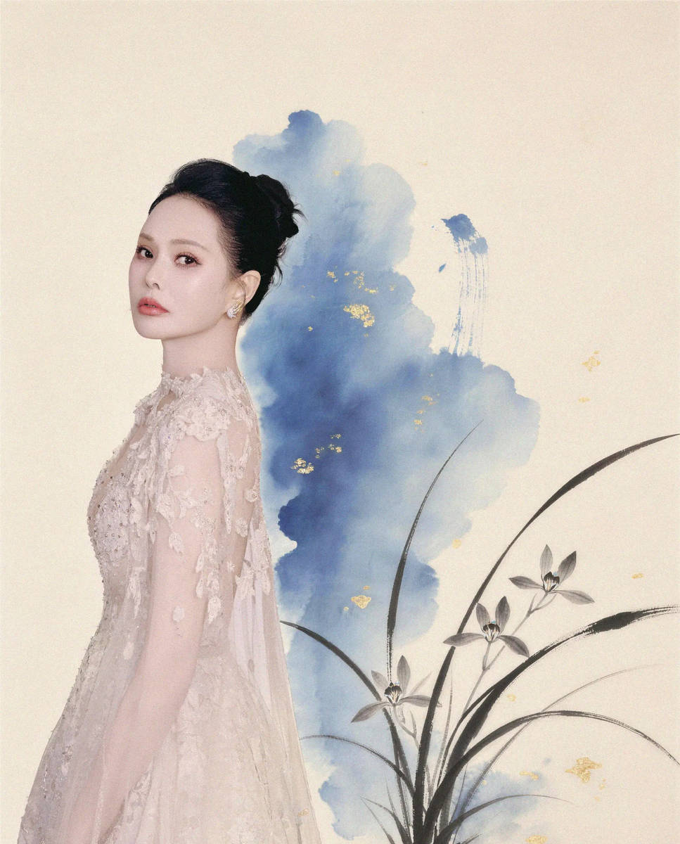 伊能静身着浅粉刺绣纱裙喜迎财神 气质清冷又温婉