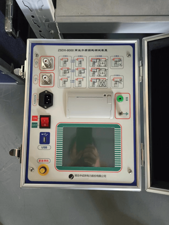5,cn标准电容输入插座6,cx试品输入插座7,触摸显示屏8,接地接线柱9,es