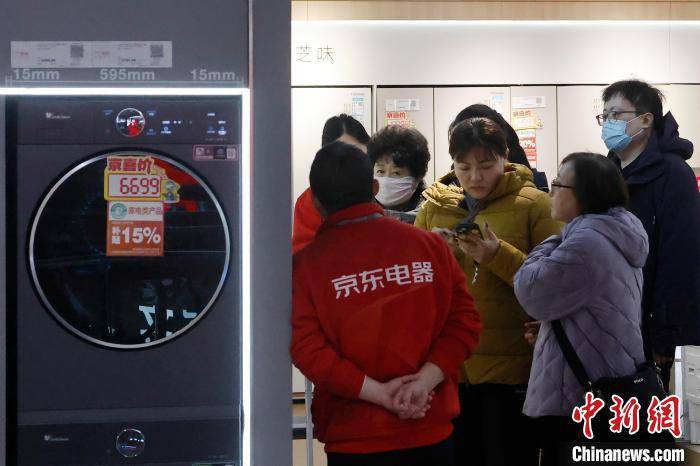 ng体育平台：新春见闻）上海：政策补贴“点燃”春节期间消费市场(图7)